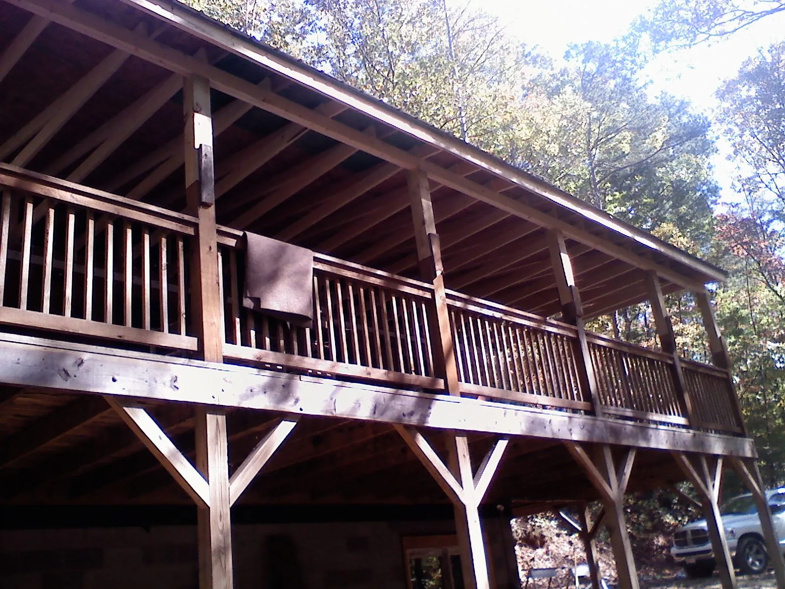 Timber framing under a new elevated porch and deck — Roof Leak Repair in Belgium by Roofing Brothers